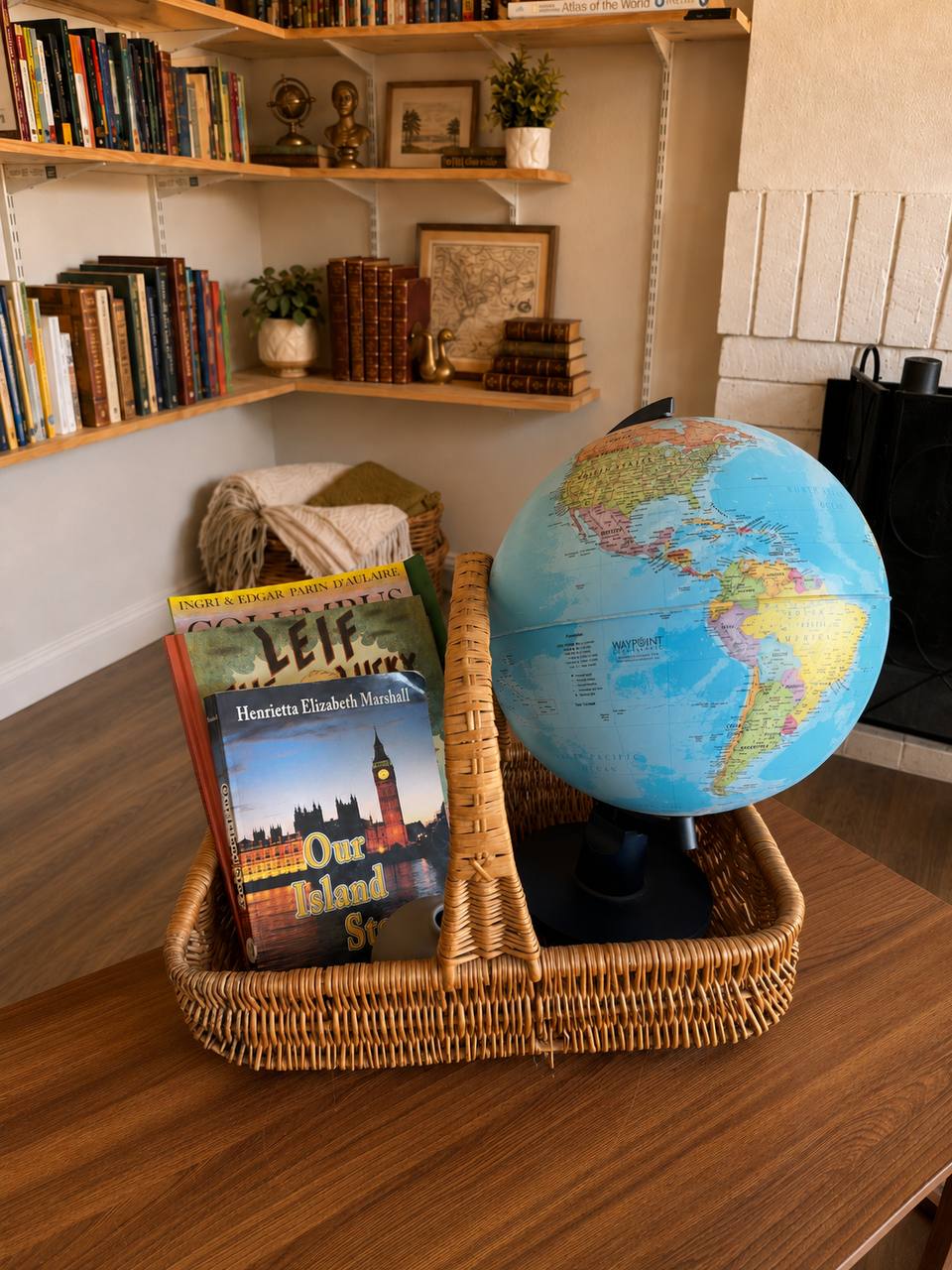 Grade 2 British and American history basket with living books, narration notebook, and globe