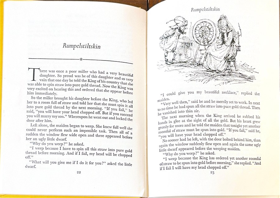 An open book showing the story Rumpelstiltskin during a lunchtime read-aloud